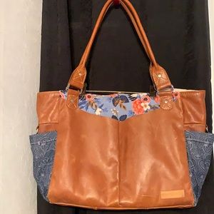 Real Leather and fabric bag..very clean..